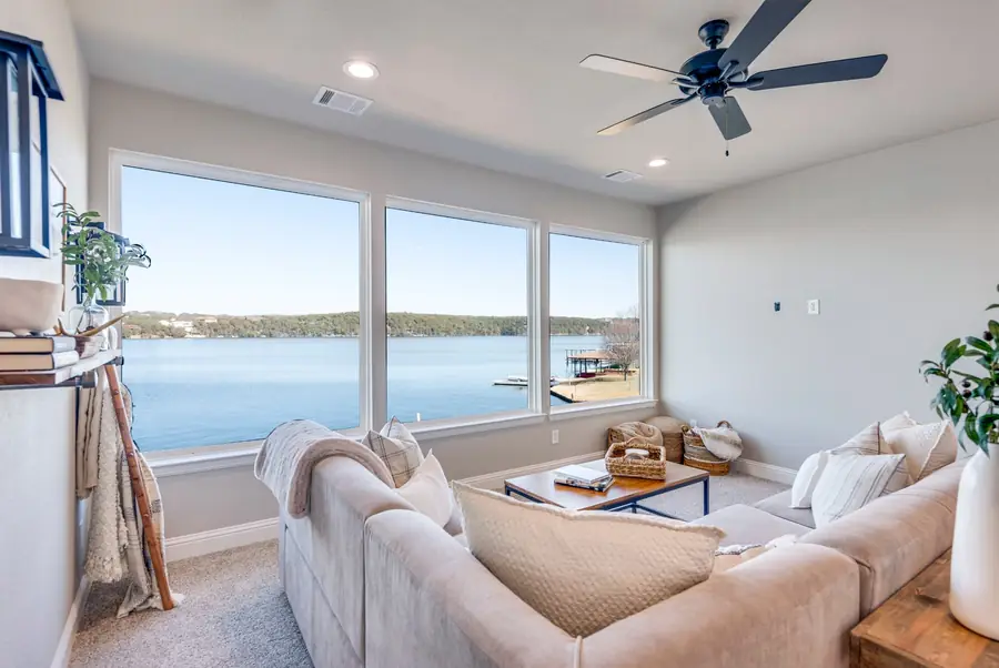 Wall of windows in the upstairs lounge overlooking the water