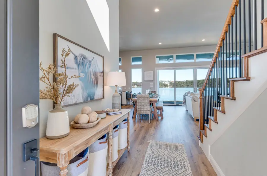 Entryway looking into the open-concept living space with lake views