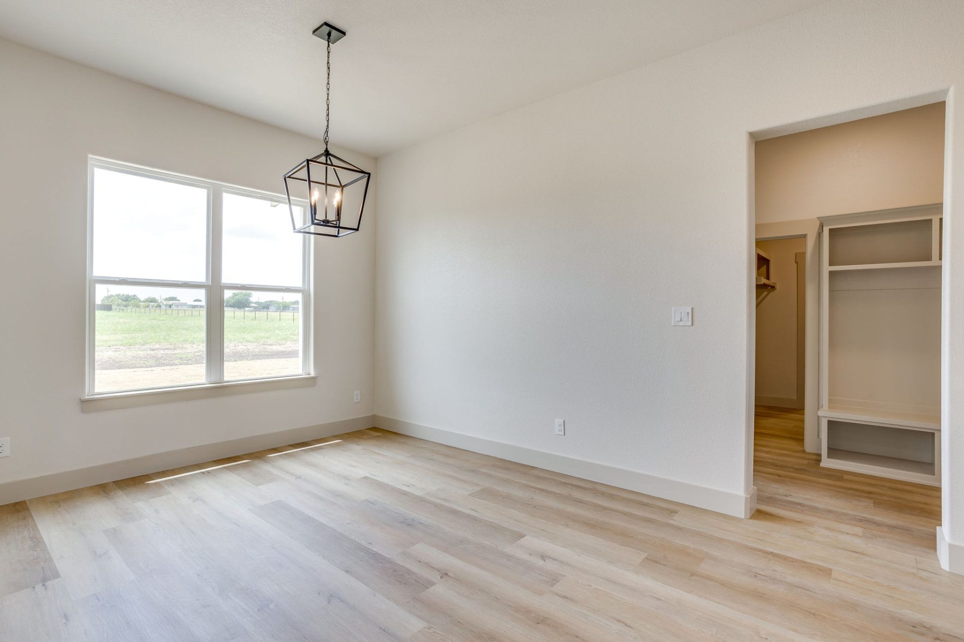 Bright dining room with large windows