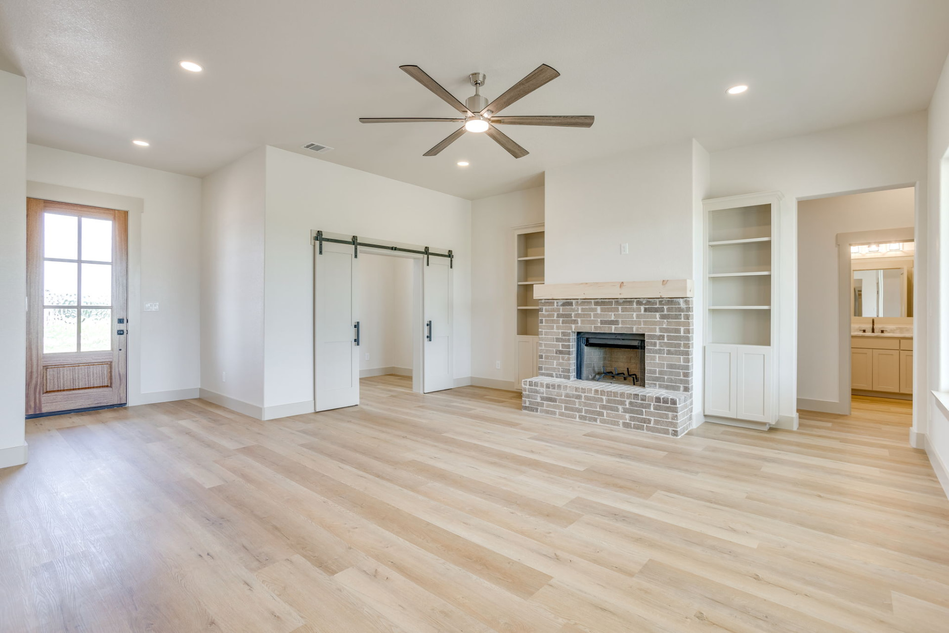 Living room looking toward the foyer and front office