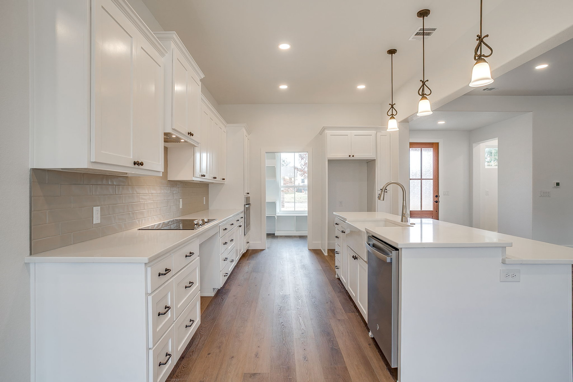 Walk-in pantry with built-in wood shelving
