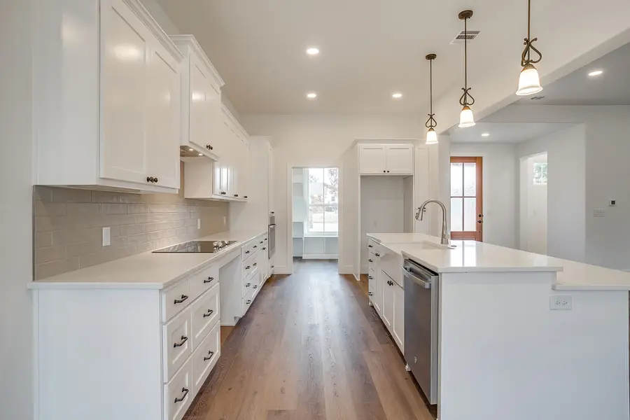 Walk-in pantry with built-in wood shelving