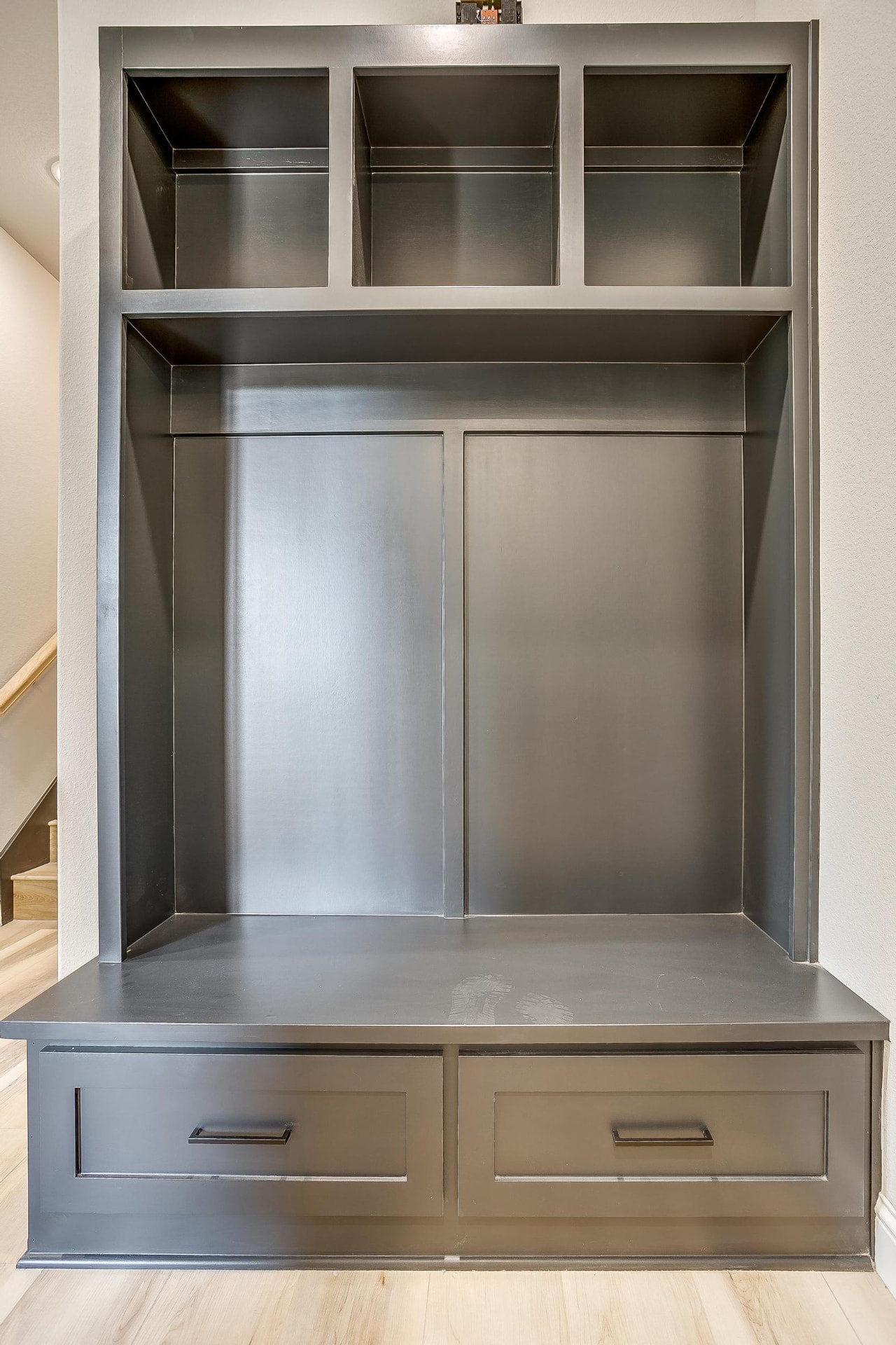 Mudroom built-in with cubbies, drawers, and bench