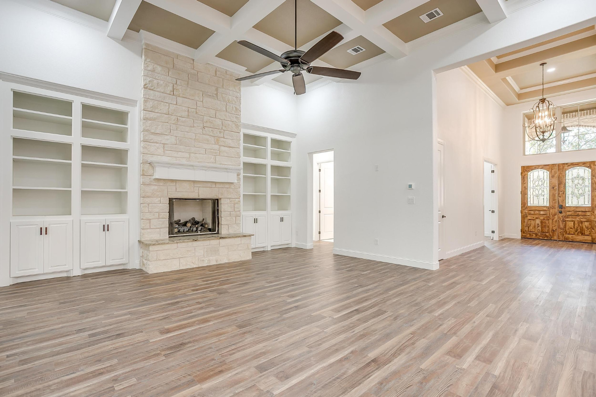 Living room seating area with stone hearth detail