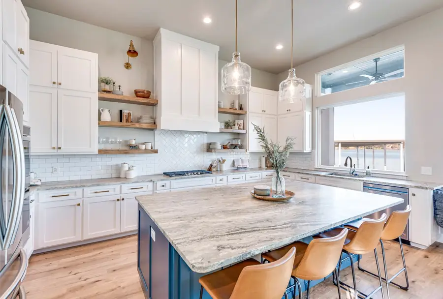 Kitchen workspace with white herringbone tile backsplash