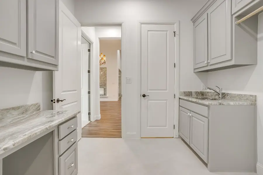 Laundry room looking back toward the hallway