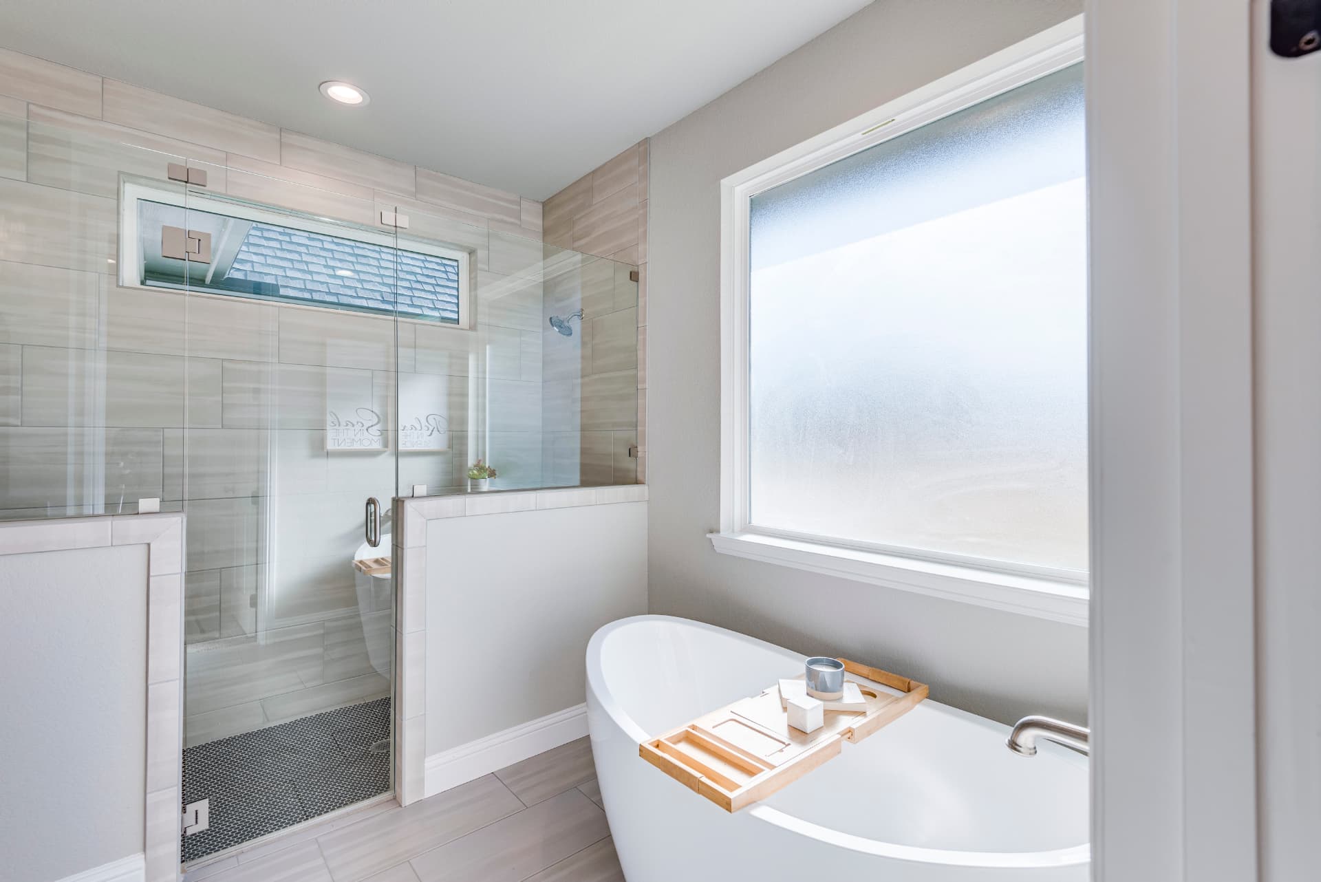Primary bath with freestanding tub and glass walk-in shower