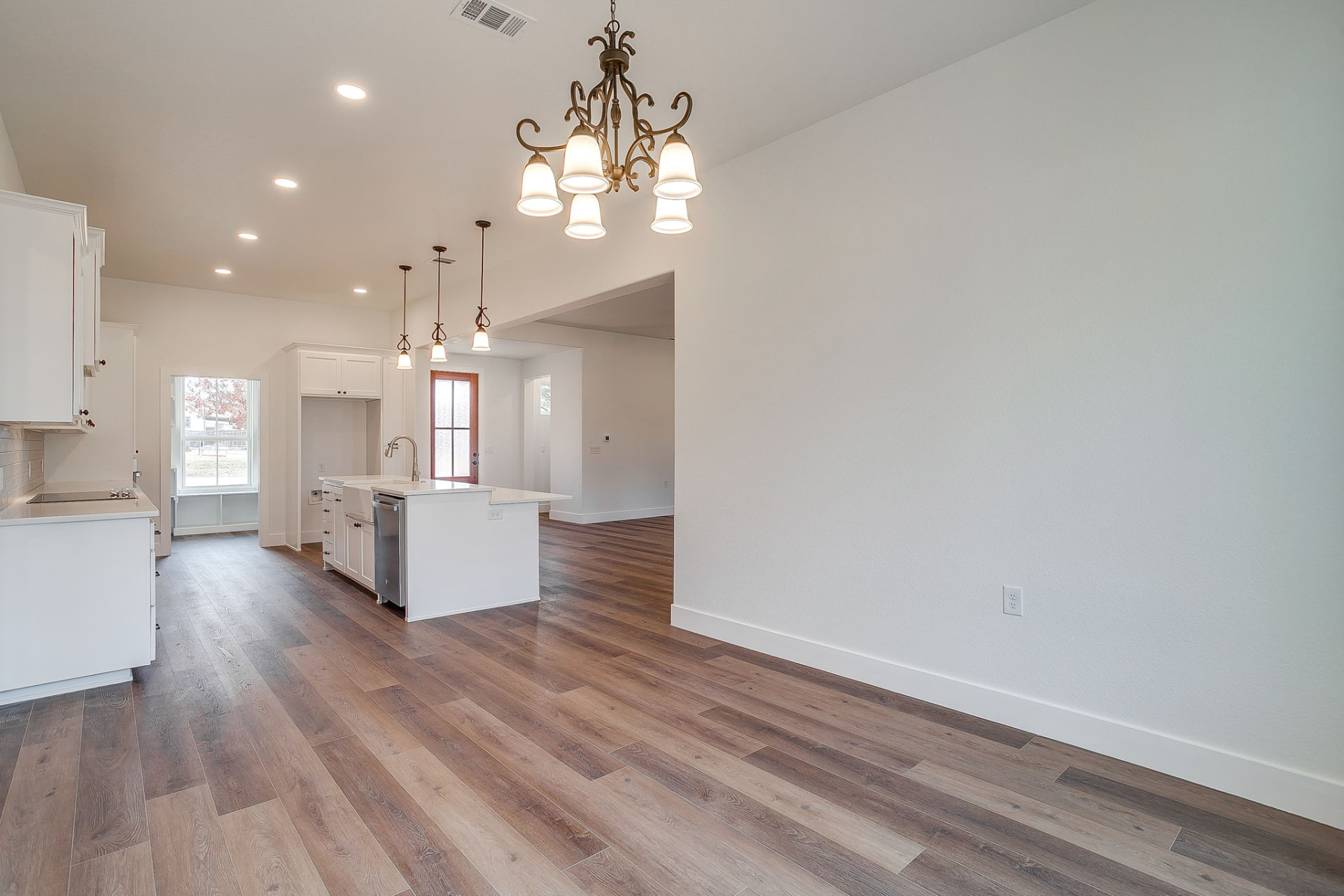 Guest bedroom with vaulted ceiling and ceiling fan