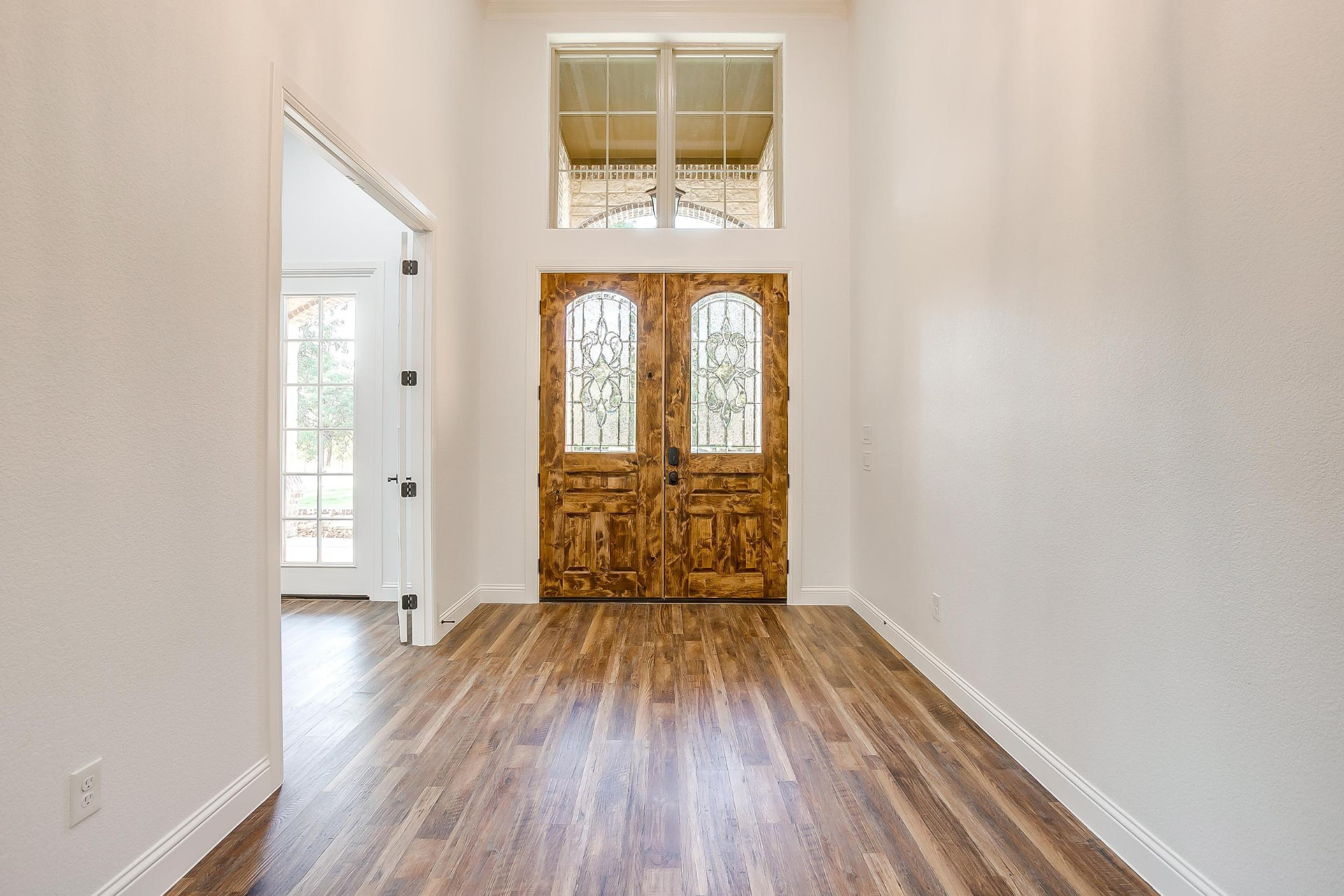 Front entry hall looking toward the built-in library