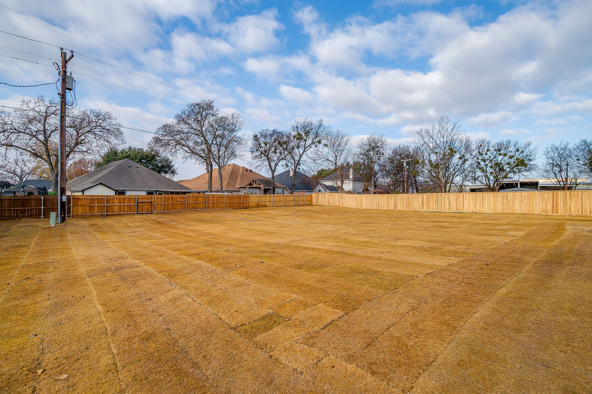 Large corner lot and backyard of the completed Granbury custom home