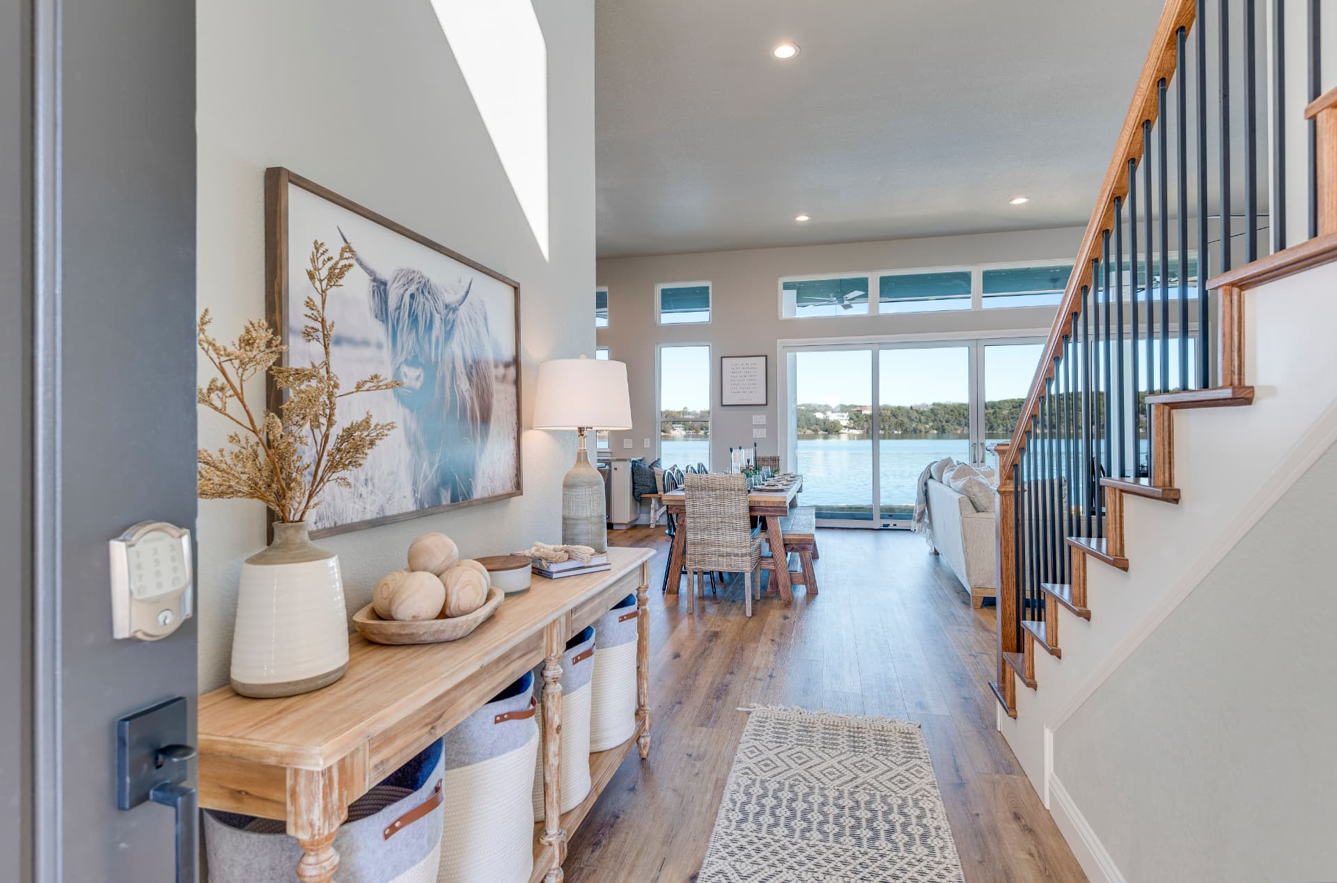 Entryway looking into the open-concept living space with lake views