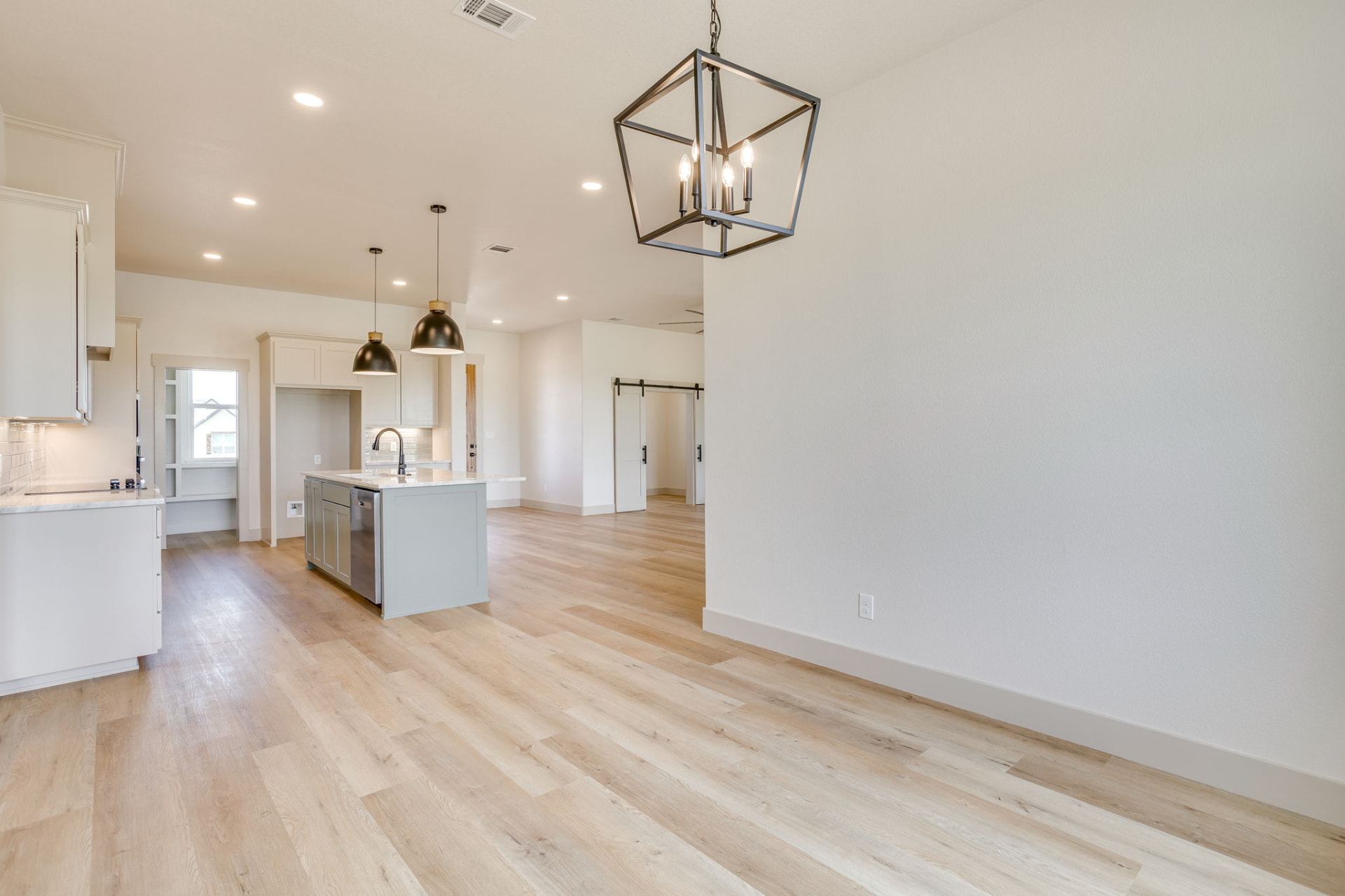 Symmetrical view of the open-concept layout from the dining area