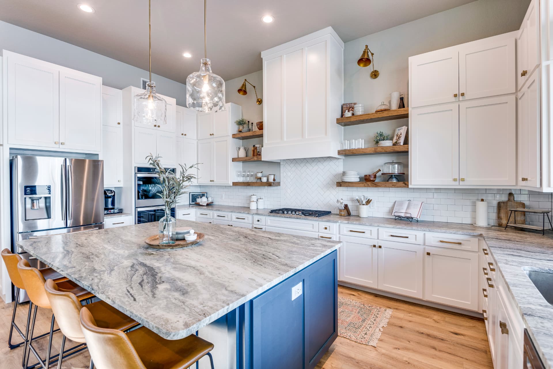 Kitchen with stainless refrigerator and perimeter cabinetry