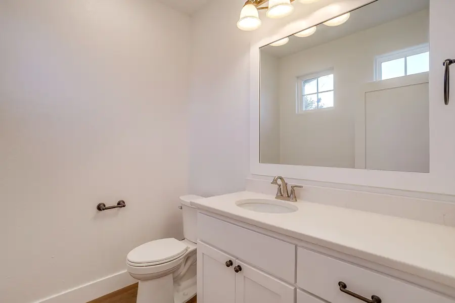 Powder bath with pedestal vanity
