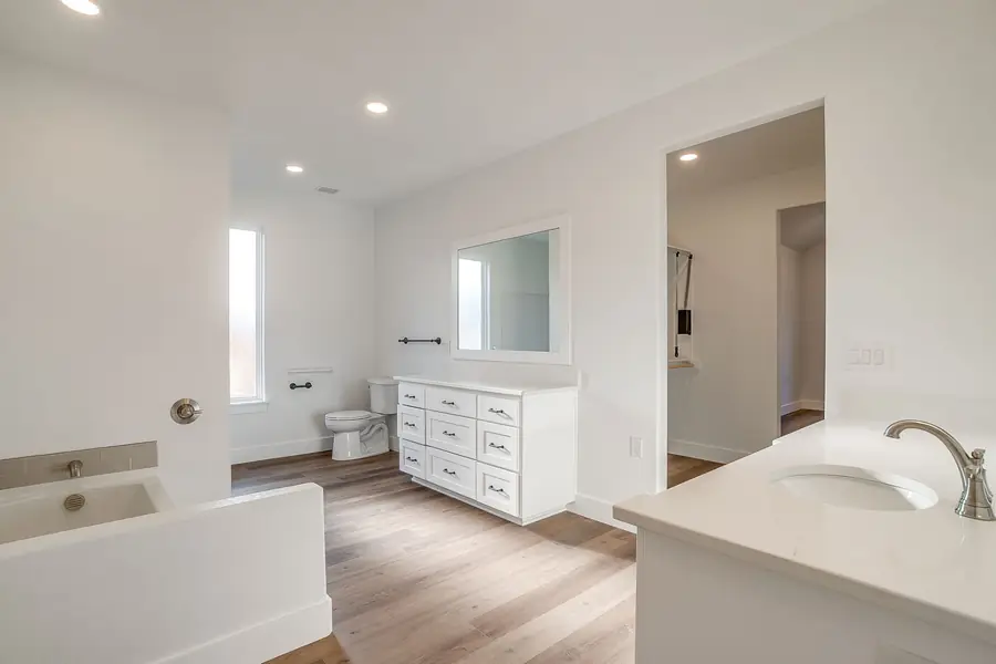 Bedroom with recessed lighting and vaulted ceiling