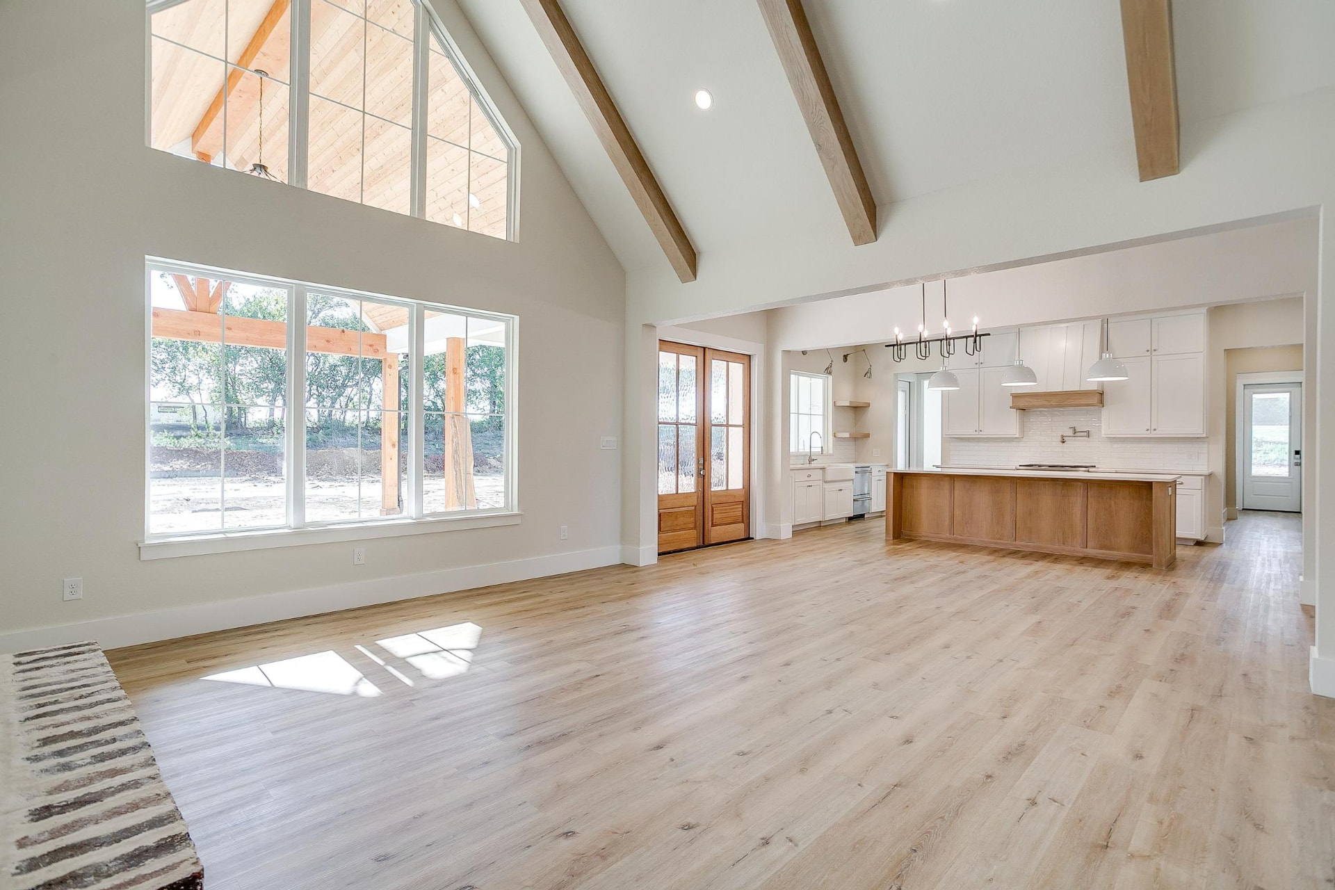 View from the kitchen back toward the bright living room