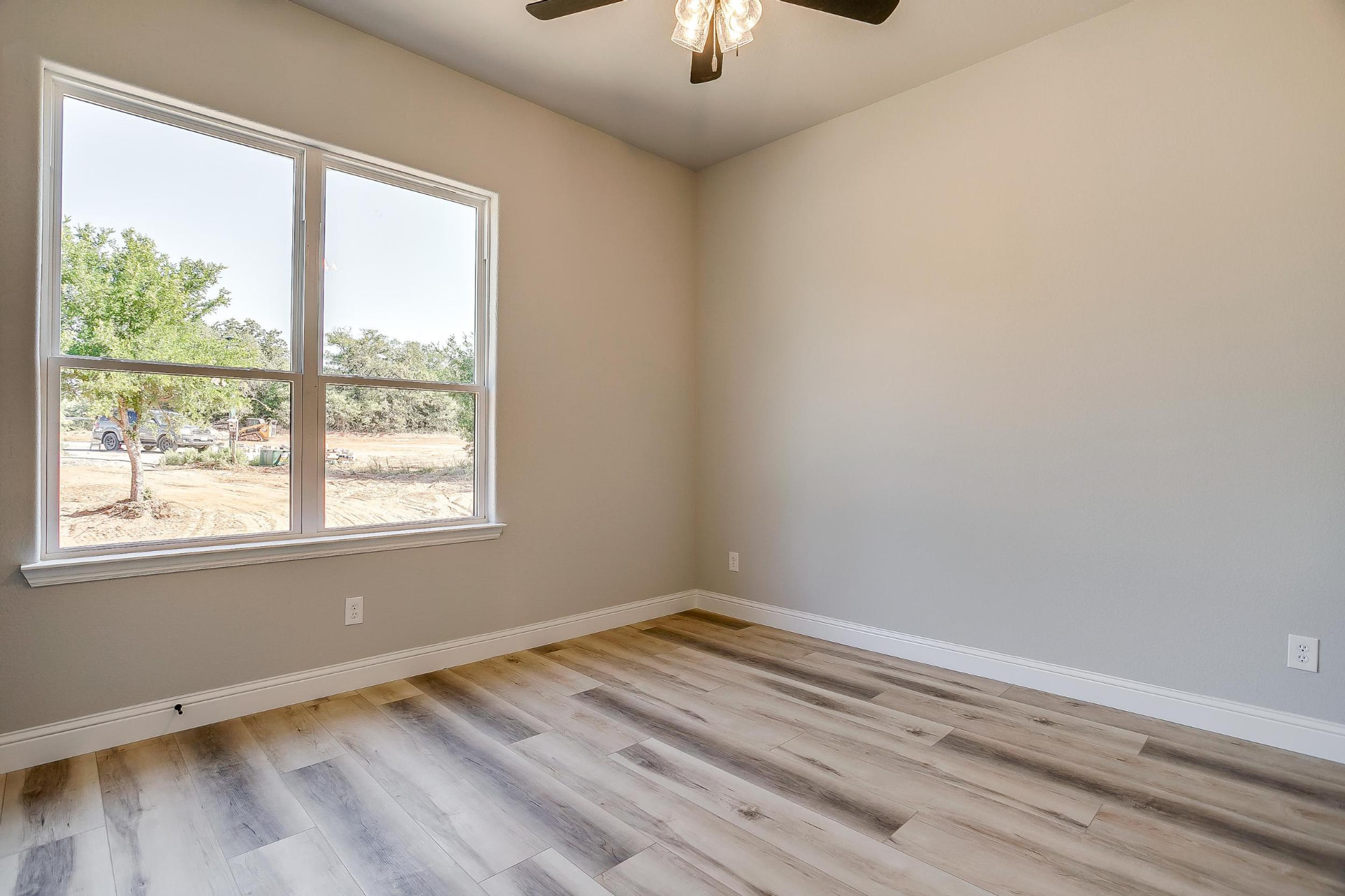 Bedroom window overlooking the neighboring build site