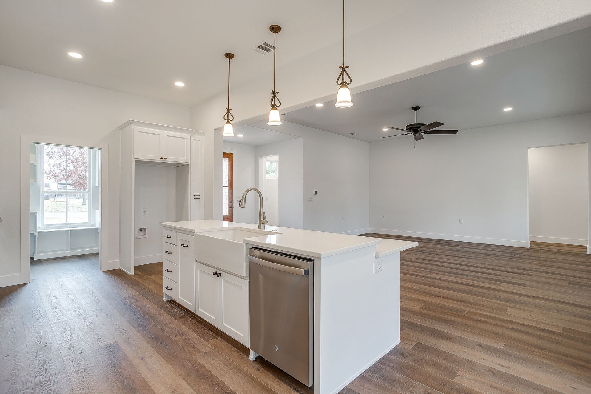 Dining space adjacent to the kitchen with backyard views