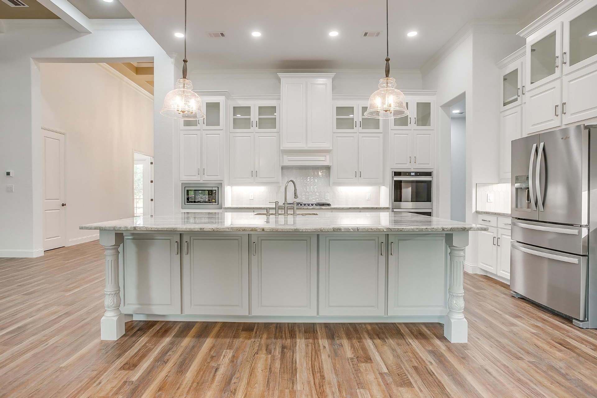 Front view of the large marble kitchen island
