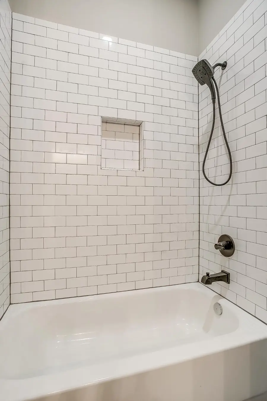 Subway tile tub and shower surround