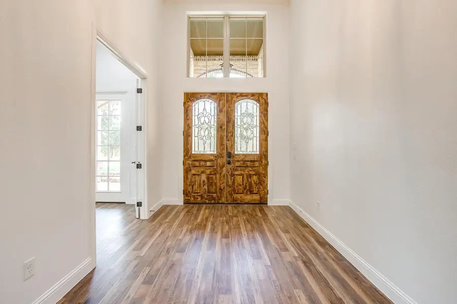Front entry hall looking toward the built-in library