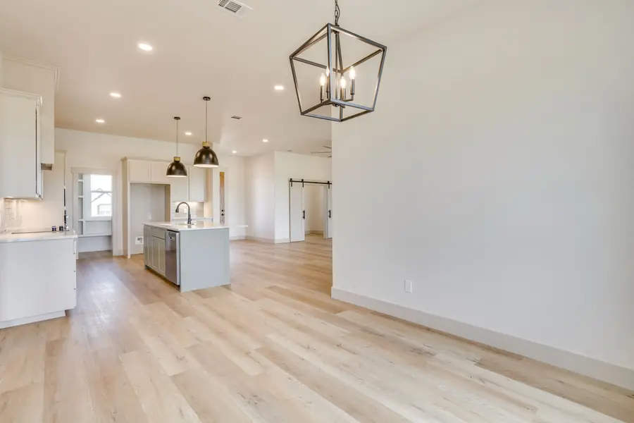 Symmetrical view of the open-concept layout from the dining area