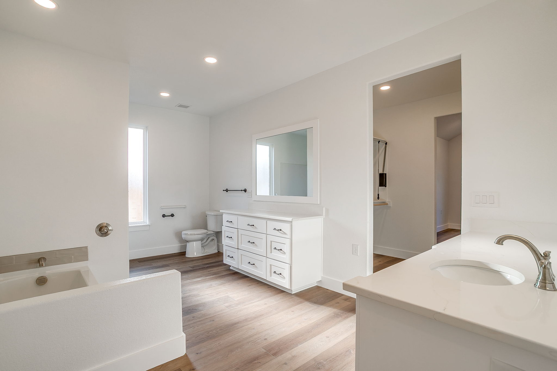 Bedroom with recessed lighting and vaulted ceiling