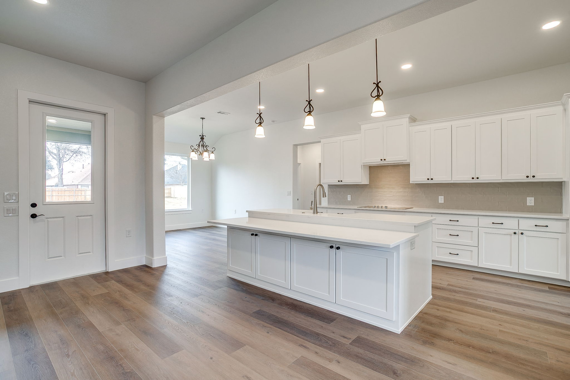 Kitchen island seating and pendant lighting detail