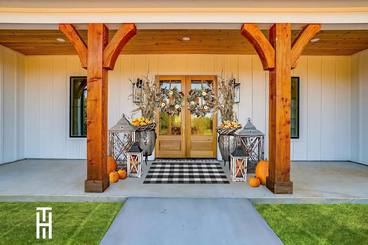 Custom porch of a Taylor Homes residence at golden hour